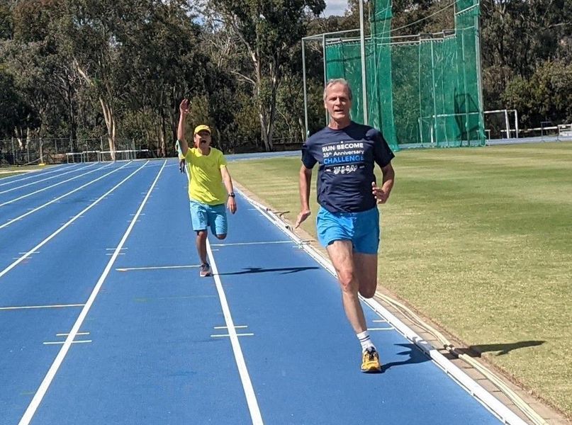 Prachar and Sarankhuu doing their 2 mile race on the same track where the Sri Chinmoy 48 hour Track Festival was held.